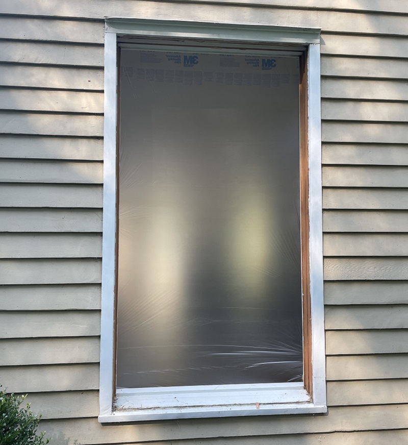 Plastic wrap the window so the dust does not enter the house
